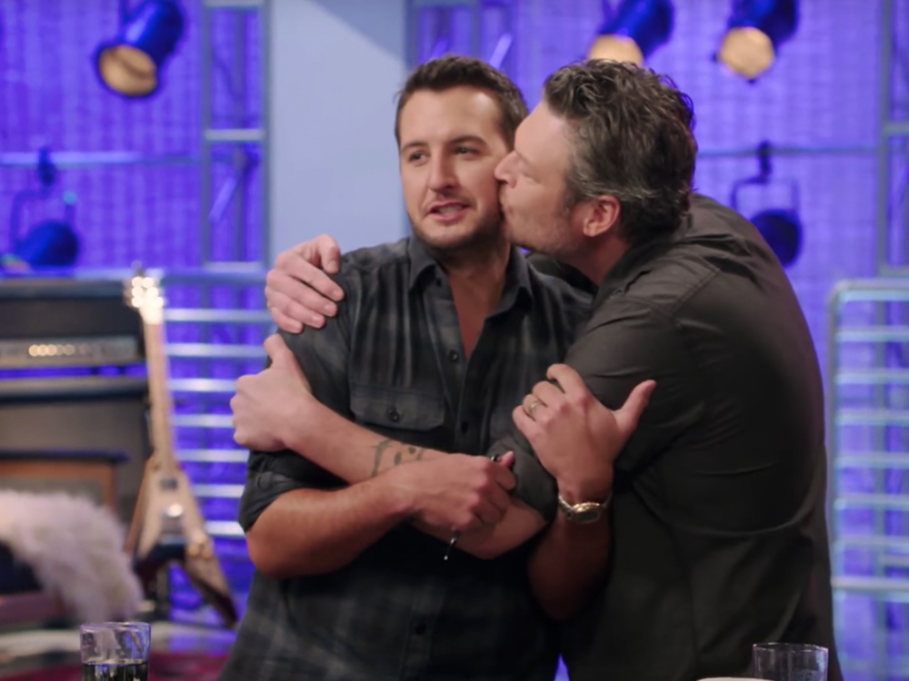 Watch Coach Blake Shelton and Mentor Luke Bryan Spread the Love During “The Voice” Battle Rounds